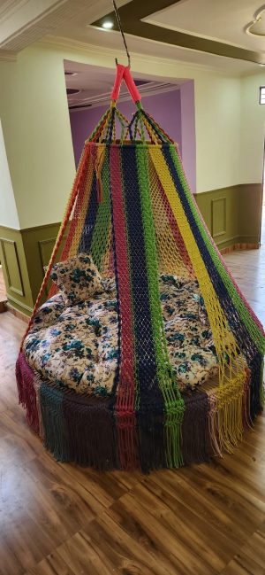 Rainbow macrame swing