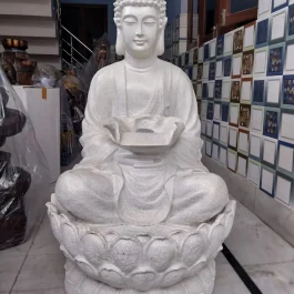 Buddha fountain lotus meditating