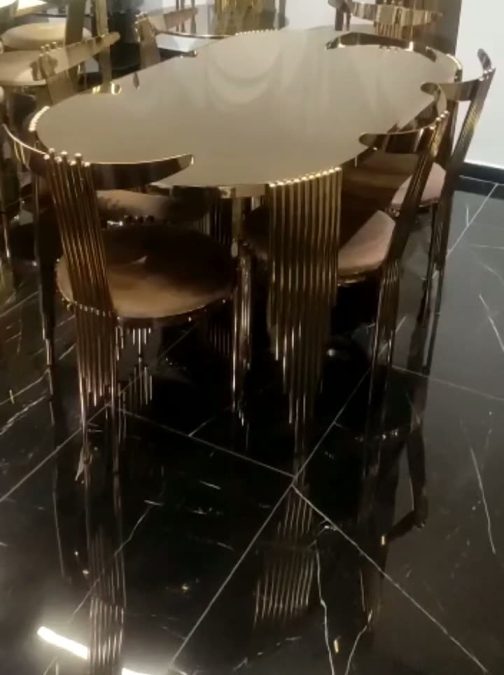 ss pvd glass top dining table