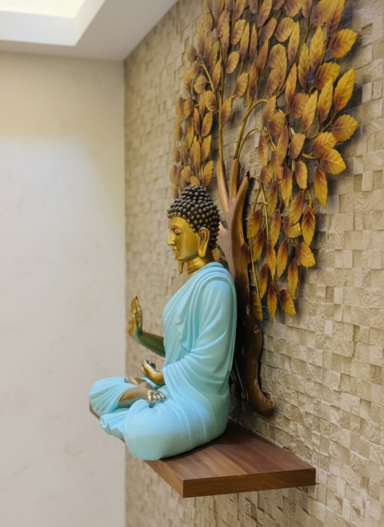 Blue Buddha statue with trees